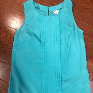 Blue sleeveless blouse